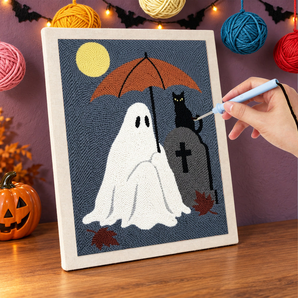 Punching the Umbrella Ghost and Cat design with the punch needle