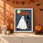 Finished Umbrella Ghost and Cat punch needle canvas on a wall