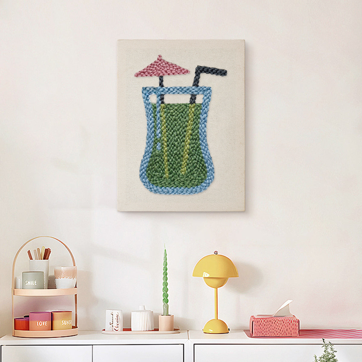 Finished Umbrella Smoothie punch needle canvas on a wall