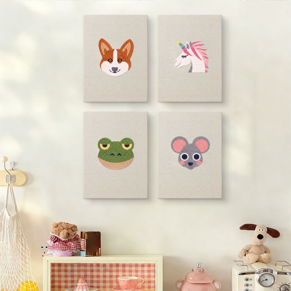 The four Unicorn and Frog mini canvases on a wall above a shelf