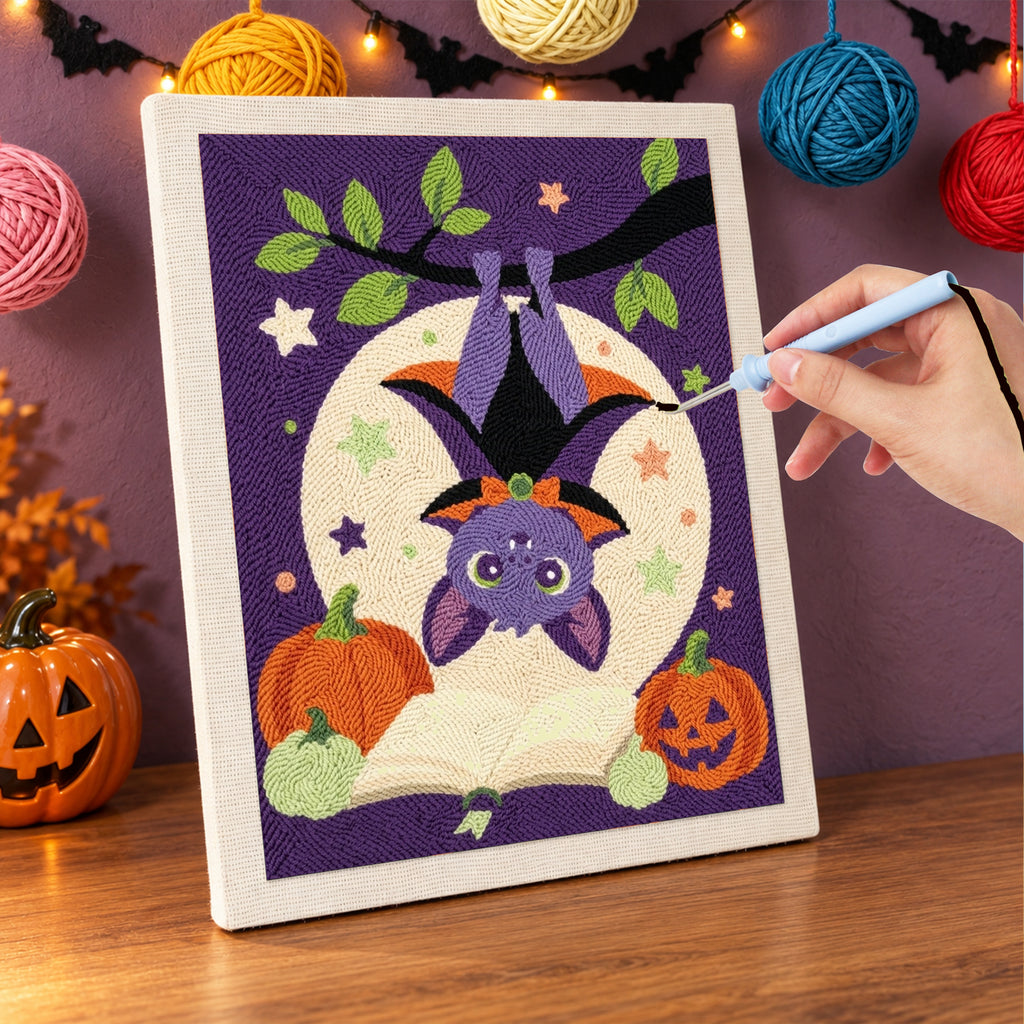 Punching the Upside Down Bat design with the punch needle