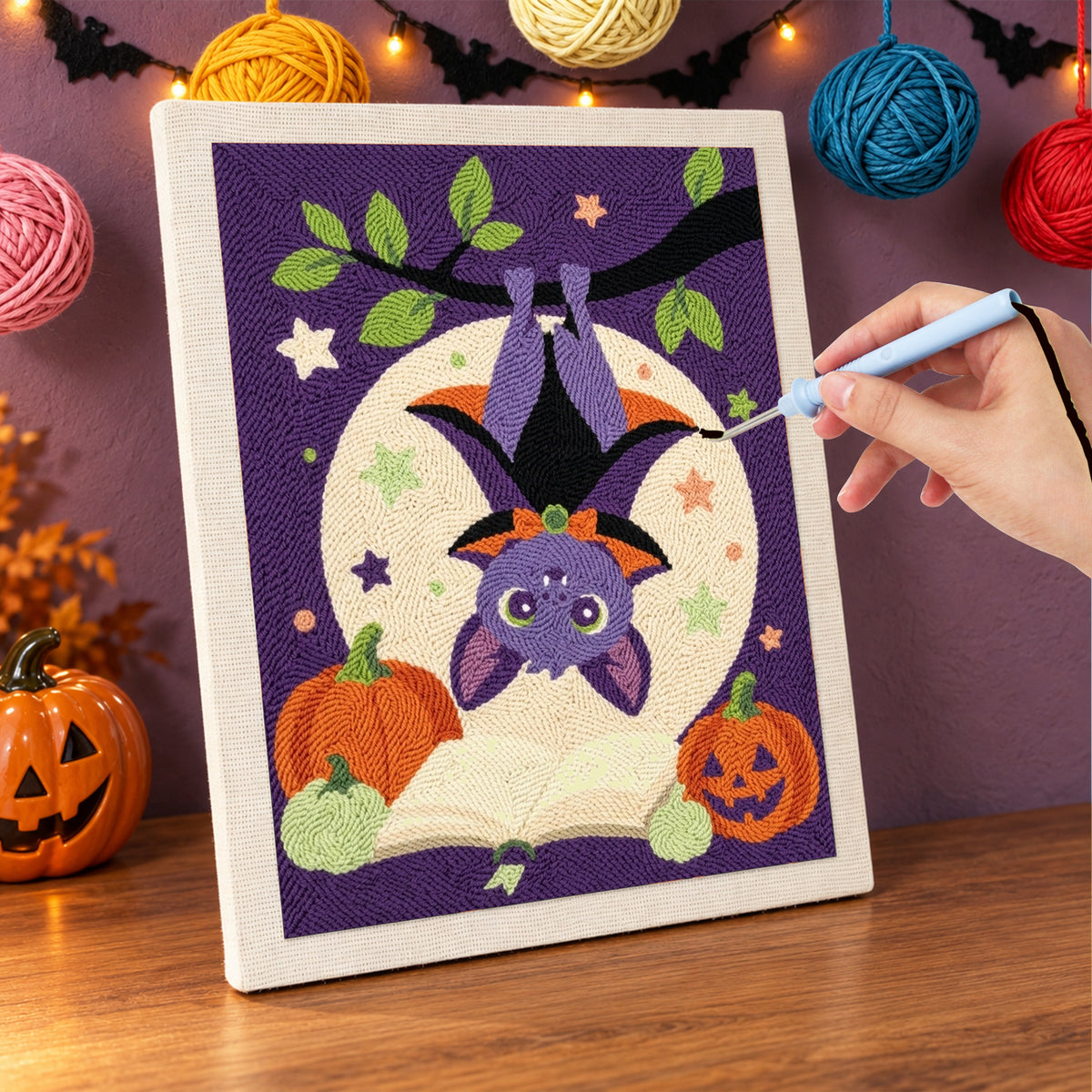 Punching the Upside Down Bat design with the punch needle