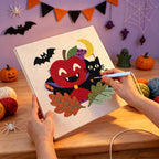 Punching the Vampire Apple and Cat design with the punch needle