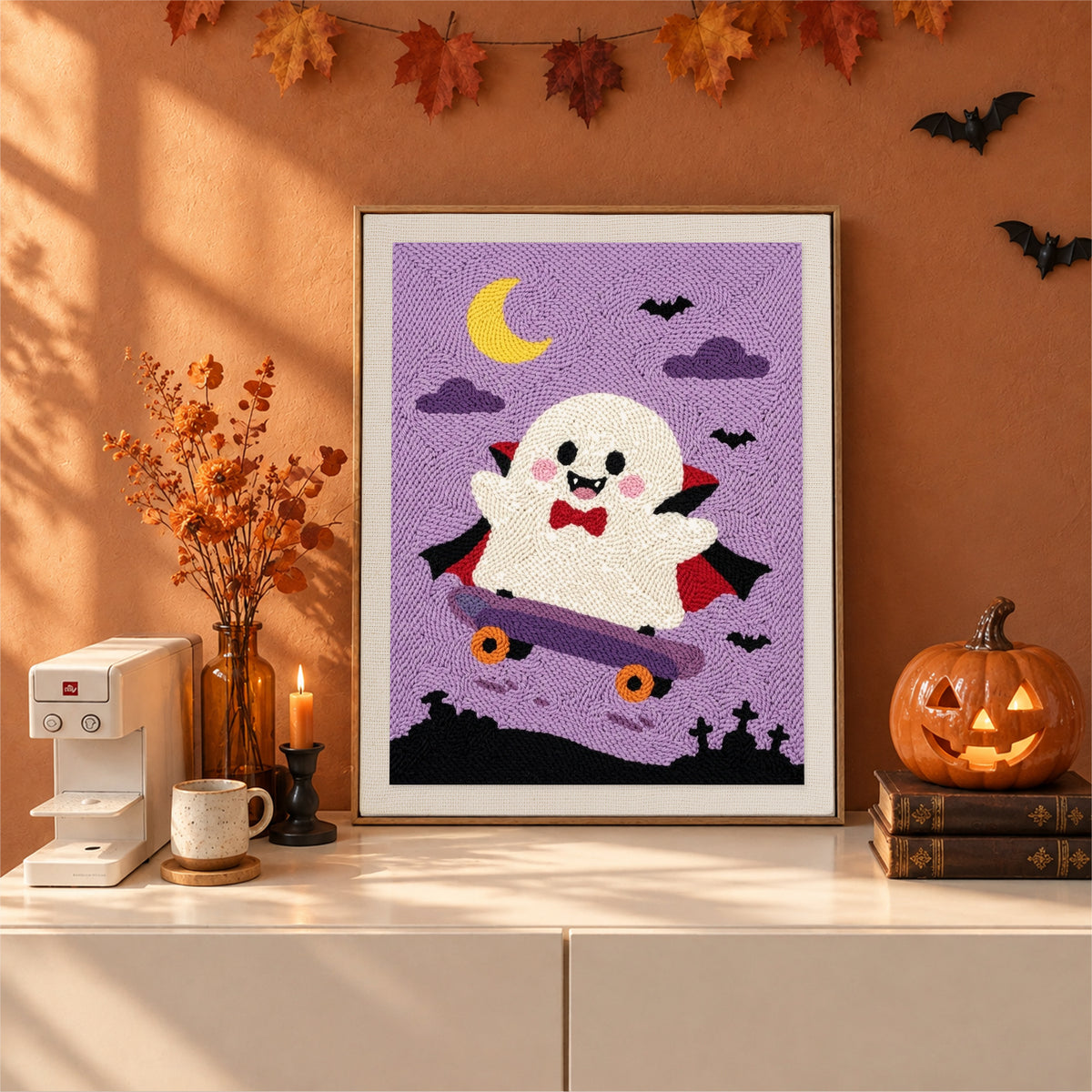 Finished Vampire Ghost Skater punch needle canvas on a wall