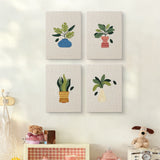 The four Vase Leaf Quartet mini canvases on a wall above a shelf