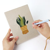 Punching a Vase Leaf Quartet mini canvas with the punch needle