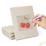 Hand punching one of the Watermelon and Lemon mini canvases