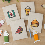 The four finished Watermelon Lunch mini canvases laid out on a table
