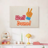 Finished Well Done Hand punch needle canvas on a wall