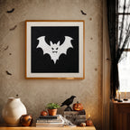 Finished White Bat on Black punch needle canvas on a wall
