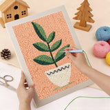 Punching the White Pot on Peach design with the punch needle