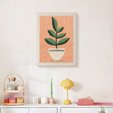 Finished White Pot on Peach punch needle canvas on a wall