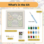 What is in the Wild Grave Flowers kit: printed canvas, punch needle, threader, threads, color guide and hangers