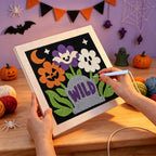 Punching the Wild Grave Flowers design with the punch needle