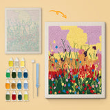 Wildflower Meadow canvas before and after punching, with the threads and tools