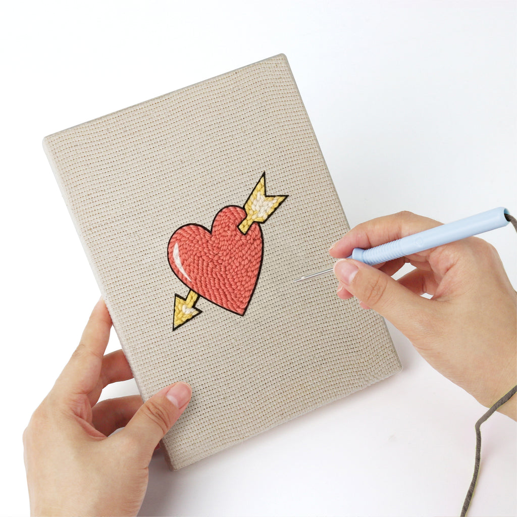 Punching a Winged Heart Mix mini canvas with the punch needle