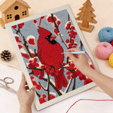 Punching the Winter Cardinal design with the punch needle