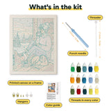 What is in the Winter Porch Morning kit: printed canvas, punch needle, threader, threads, color guide and hangers
