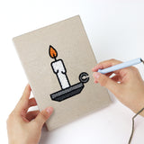 Punching a Witch and Bunting mini canvas with the punch needle