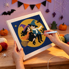 Punching the Witch and Wizard Date design with the punch needle