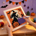 Punching the Witch at the Cauldron design with the punch needle