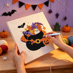 Punching the Witch Boot Bouquet design with the punch needle