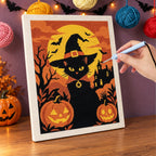 Punching the Witch Cat at Sunset design with the punch needle