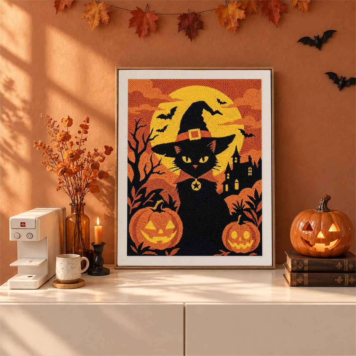 Finished Witch Cat at Sunset punch needle canvas on a wall