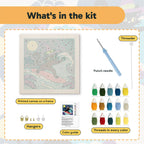 What is in the Witch Cat on a Wave kit: printed canvas, punch needle, threader, threads, color guide and hangers