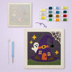 Witch Hat House canvas before and after punching, with the threads and tools