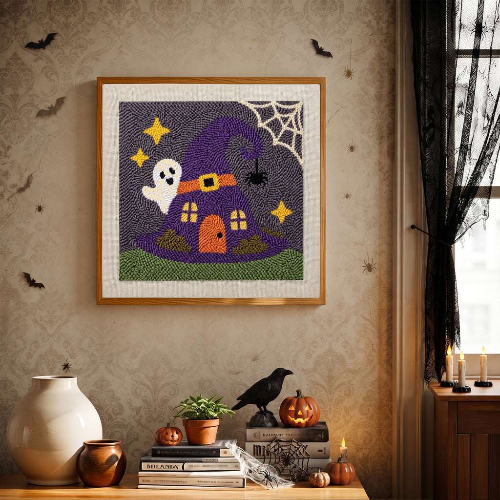 Finished Witch Hat House punch needle canvas on a wall