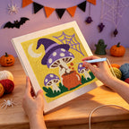 Punching the Witch Hat Mushroom Brew design with the punch needle