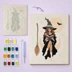 Witch on a Crescent Moon canvas before and after punching, with the threads and tools