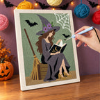 Punching the Witch Reading Outdoors design with the punch needle