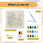 What is in the Witch Watering Pumpkins kit: printed canvas, punch needle, threader, threads, color guide and hangers