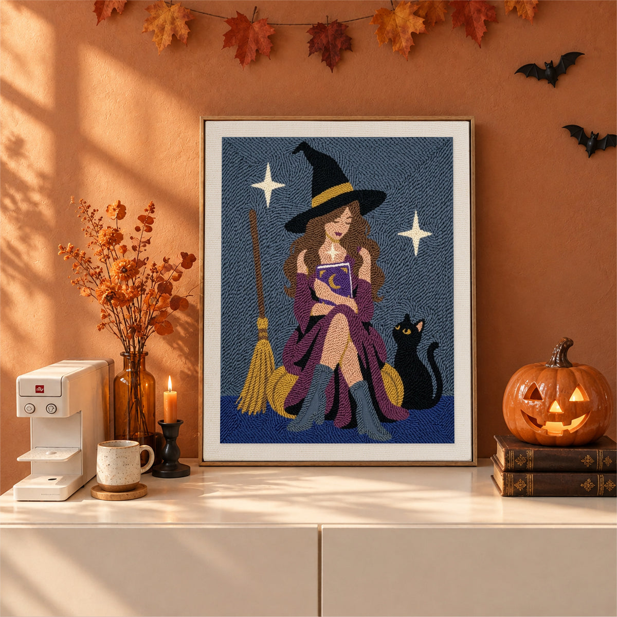 Finished Witch with a Spell Book punch needle canvas on a wall