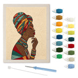Woman in Headwrap punch needle kit: finished canvas with threads, punch needle and threader