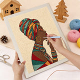 Punching the Woman in Headwrap design with the punch needle
