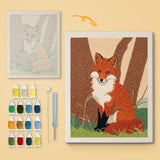 Woodland Fox canvas before and after punching, with the threads and tools