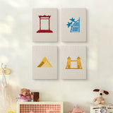 The four World Landmarks mini canvases on a wall above a shelf