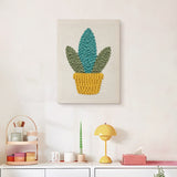 Finished Yellow Basket Plant punch needle canvas on a wall