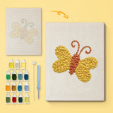 Yellow Butterfly canvas before and after punching, with the threads and tools