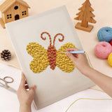 Punching the Yellow Butterfly design with the punch needle