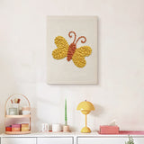 Finished Yellow Butterfly punch needle canvas on a wall