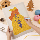 Punching the Yellow Money Bag design with the punch needle