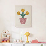 Finished Yellow Pom Flowers punch needle canvas on a wall