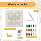 What is in the Yummy Candy Monster kit: printed canvas, punch needle, threader, threads, color guide and hangers